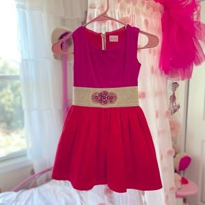 Zoe Ltd two colored cocktail dress with a gold waste.